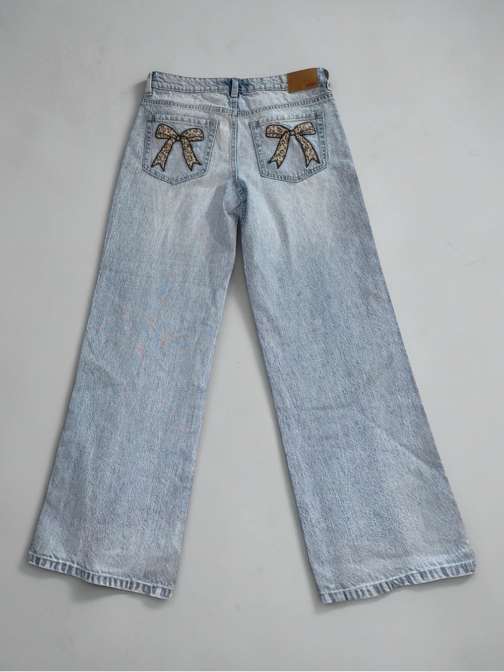 Light Wash Women's Aeropostale Baggy Wide Leg Jeans with Leopard Bow Pocket